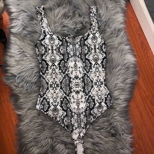 Snake print body suit